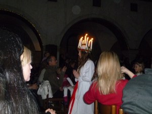 As is tradition all over teh world, a girl is chosen to play Santa Lucia and wear her crown of candles.