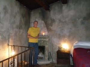 Ric in our rustic bedroom. A terrific night's sleep awaited us.