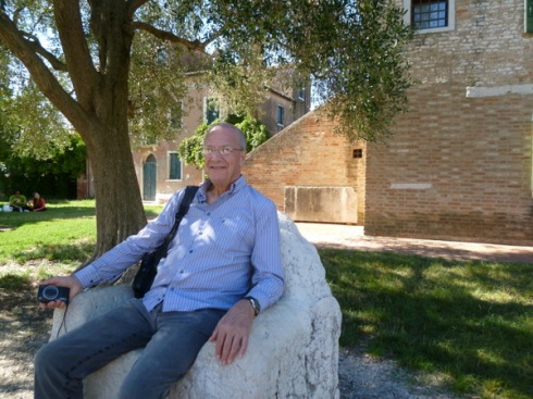 Ric relaxes on a stone throne, Torcello