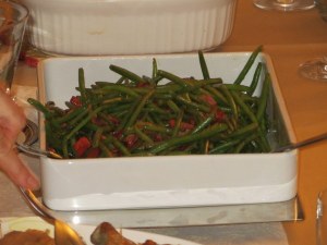 Thanksgiving green beans with red peppers and American bacon. Not your mother's green bean casserole.