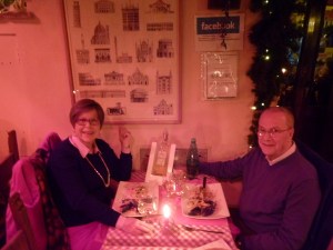 Christmas Eve by the light of the flaming heaters. The waiter took our picture.... I'd had an 18 hour day by this point. That's my excuse and I'm sticking to it. 