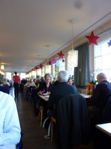 The dining room at Restaurant Bahnhoff Buffet, full of locals, no English.