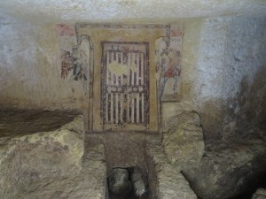 This Etruscan fresco depicts a false door designed to keep the Devil away from the tomb of the departed. 