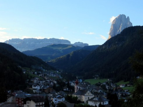 Sunrise on the Sella Group and the Sassolungo, towering over Ortisei, Italy, as seen from our terrace. 