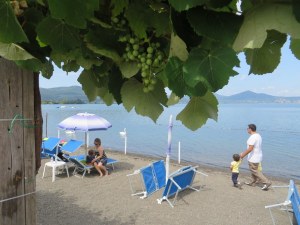 We were so lucky at Lago di Bracciano. Morning rain in Rome scared off the people who had reserved space on this beach, so we were able to claim some sand. Otherwise they would have been fully booked. It was 82 (F) and sunny for us. Perfect!
