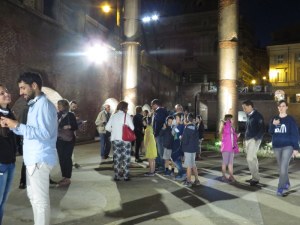 The crowd gathers and adjusts their headsets. The guide merely ushers you through the site.