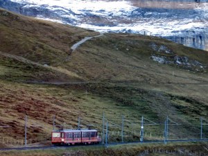 A Jungfraujoch train moves up the mountain. Most of the journey is in a tunnel inside the Eiger and the Mönch.