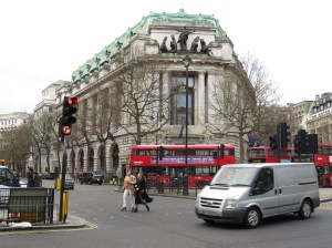 Orderly, I tell you! Look how the women areallowed to cross the street without a motorino shooting past. And no one is parked in teh crosswalk. Heaven!