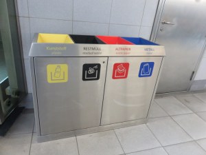 Clearly labeled and frequently emptied recycling center in public. Roma is not quite so neat....