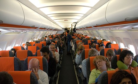 Interior of Easy Jet airplane with passengers. Courtesy of EasyJet. Yeah, this is fun. 
