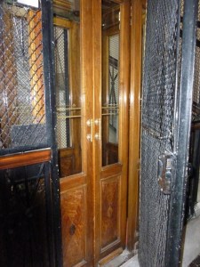 This is the elevator at our embassy apartment in Roma. You coudl get 3 not-too-big people in it. One might call it "intimate." Quaint.