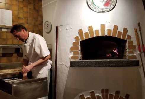 Pizza oven and man
